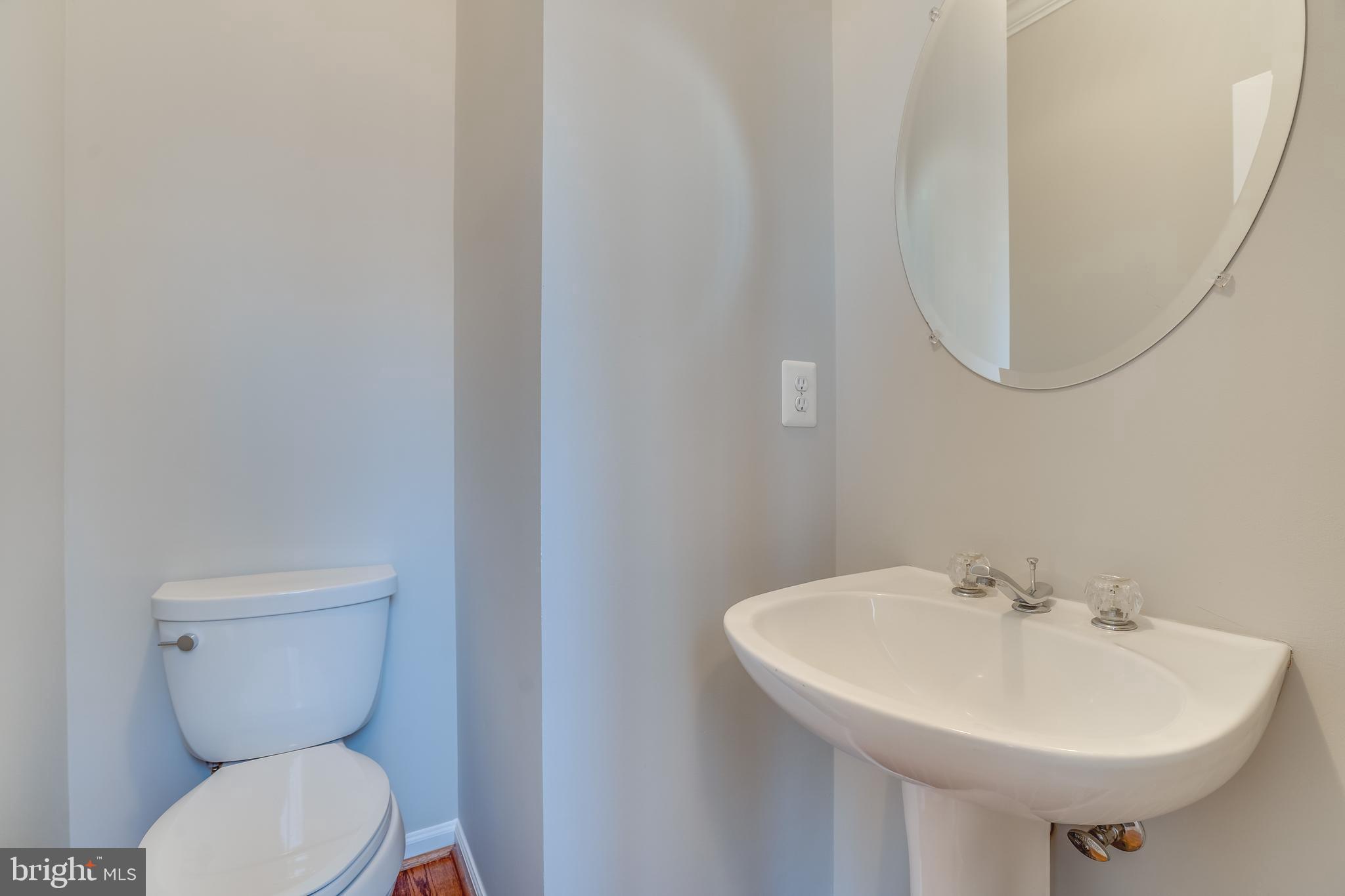 11439 Heritage Commons Way Reston, VA 20194 - Photo 17 of 38 Main Level Half Bathroom with Newer Toilet