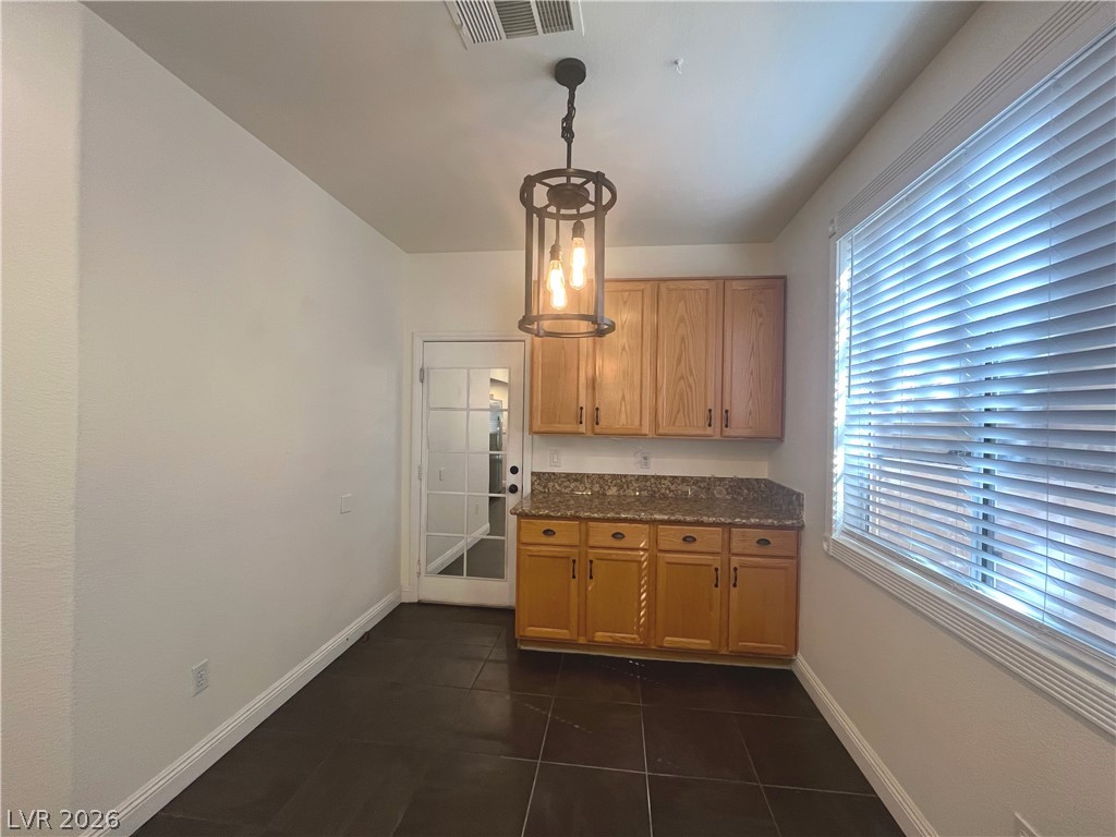1809 Snow Spring Lane Las Vegas, NV 89134 - Photo 17 of 79 Dining nook off the kitchen w/add'l cabinets