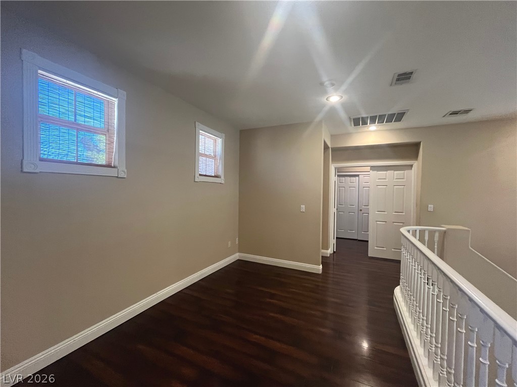 1809 Snow Spring Lane Las Vegas, NV 89134 - Photo 24 of 75 The upstairs loft is positioned to create privacy between the primary bed & the add'l rooms w/linen cabinets