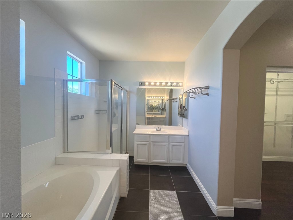 1809 Snow Spring Lane Las Vegas, NV 89134 - Photo 32 of 75 Primary bath w/dual sinks, sep tub & shower, ceramic tile floors