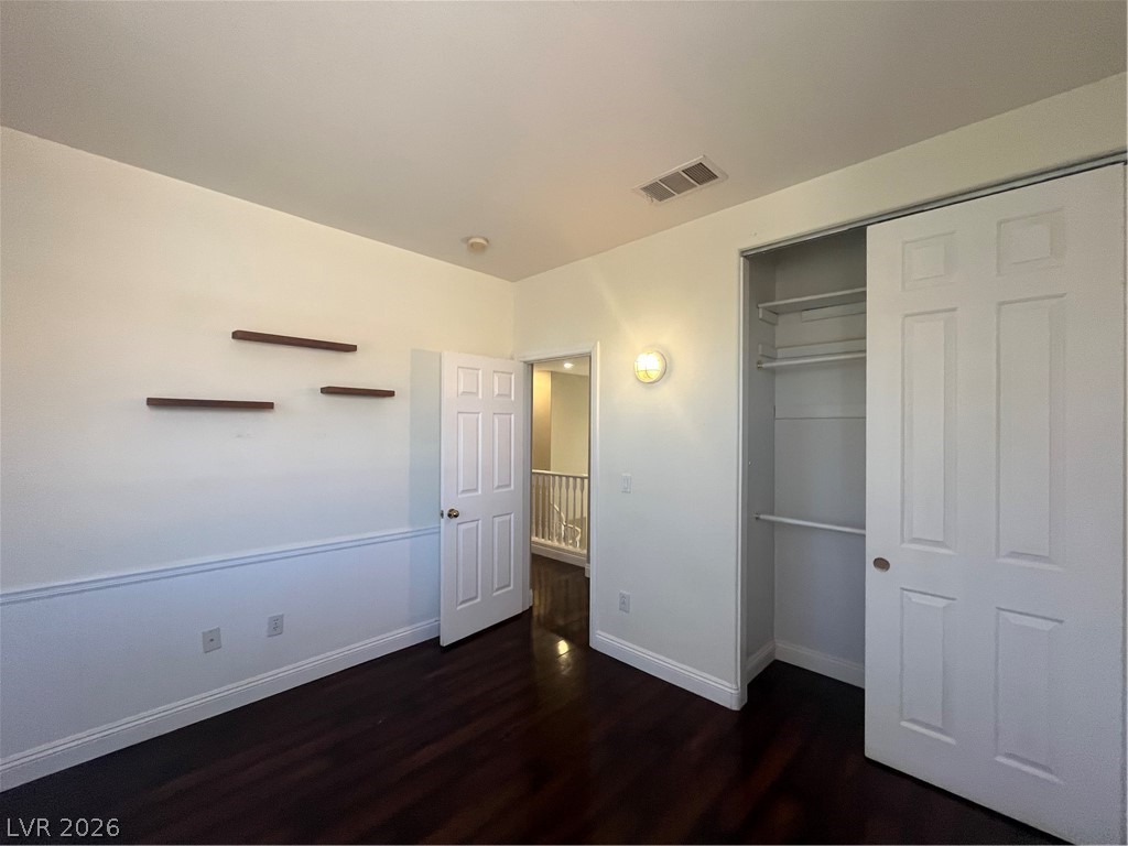 1809 Snow Spring Lane Las Vegas, NV 89134 - Photo 36 of 75 Bed 2 upstairs w/luxury vinyl floors, light and closet