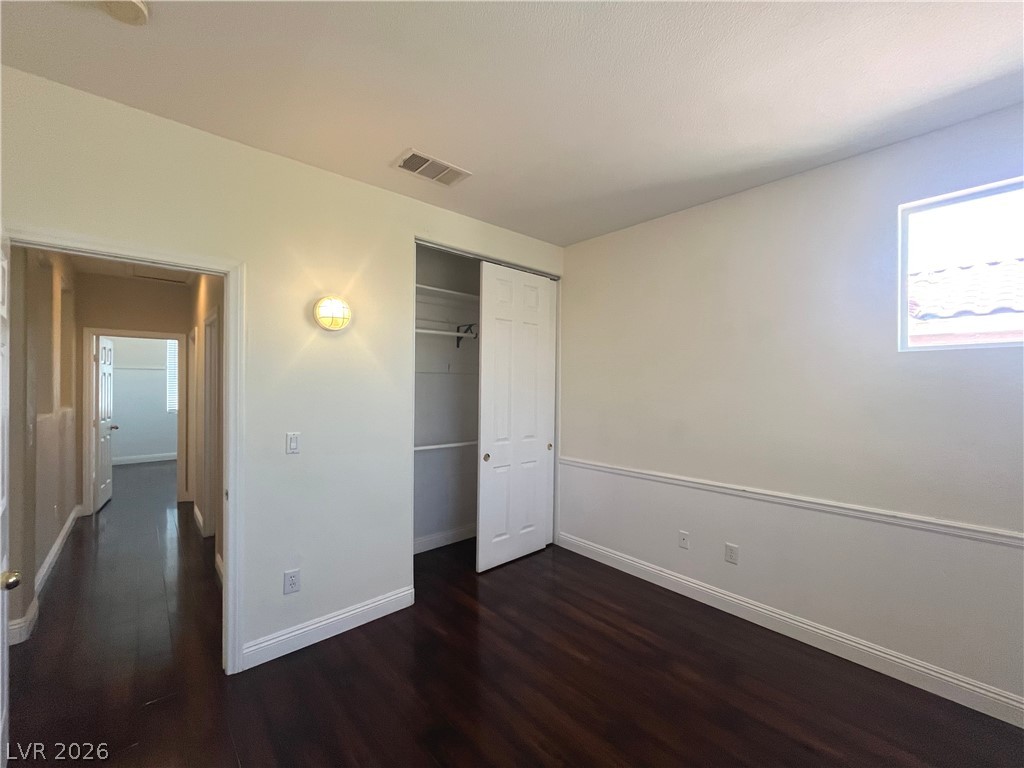 1809 Snow Spring Lane Las Vegas, NV 89134 - Photo 37 of 75 Bed 2 upstairs w/luxury vinyl floors, light and closet