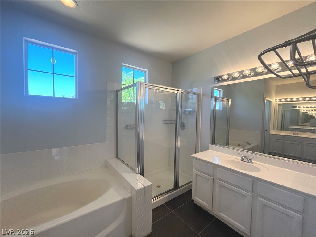 1809 Snow Spring Lane Las Vegas, NV 89134 - Photo 38 of 79 Primary bath w/dual sinks, sep tub & shower, ceramic tile floors