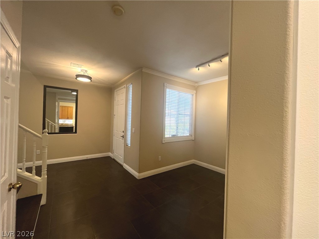 1809 Snow Spring Lane Las Vegas, NV 89134 - Photo 4 of 75 Entry welcomes you ceramic tile floors & two tone paint