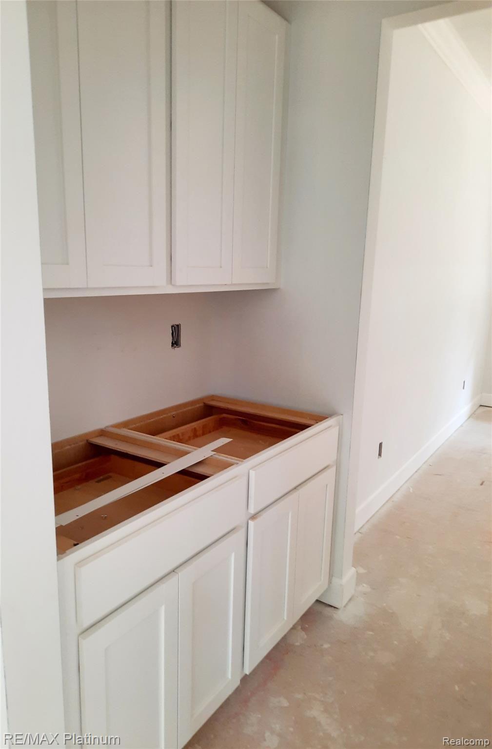 3901 North Latson Road Howell, MI 48855 - Photo 6 of 13 Butlers pantry between kitchen and dining room, great for entertaining!