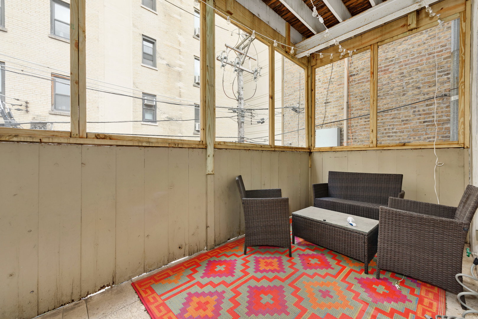 15 East Division Street, Unit 2W Chicago, IL 60611 - Photo 19 of 20 a living room with furniture and next to a window