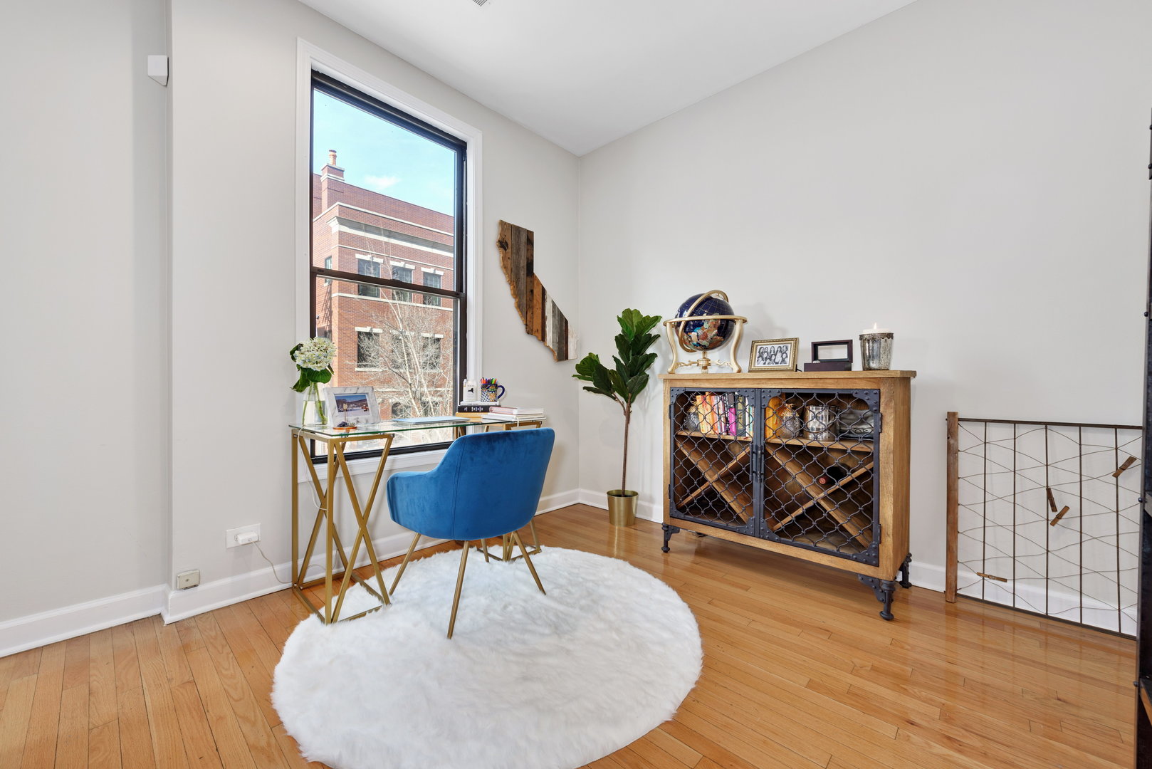 15 East Division Street, Unit 2W Chicago, IL 60611 - Photo 6 of 20 a workspace with furniture window and wooden floor