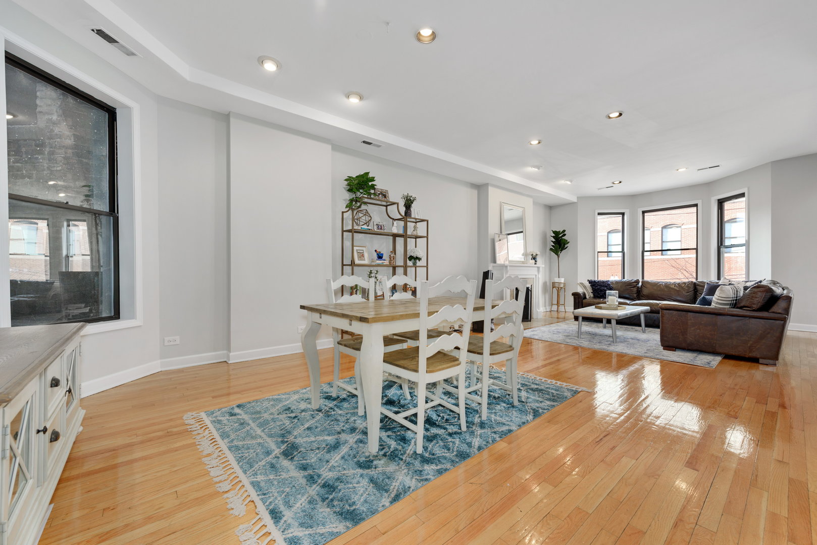 15 East Division Street, Unit 2W Chicago, IL 60611 - Photo 7 of 20 a view of a dining room with furniture
