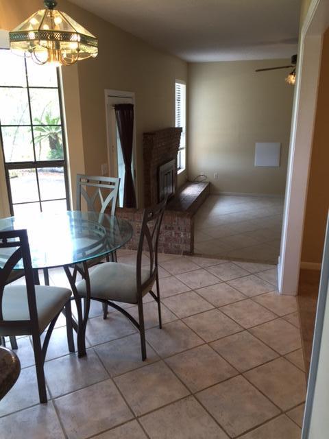 2055 Christensen Drive Navarre, FL 32566 - Photo 12 of 25 a view of a livingroom with furniture and window
