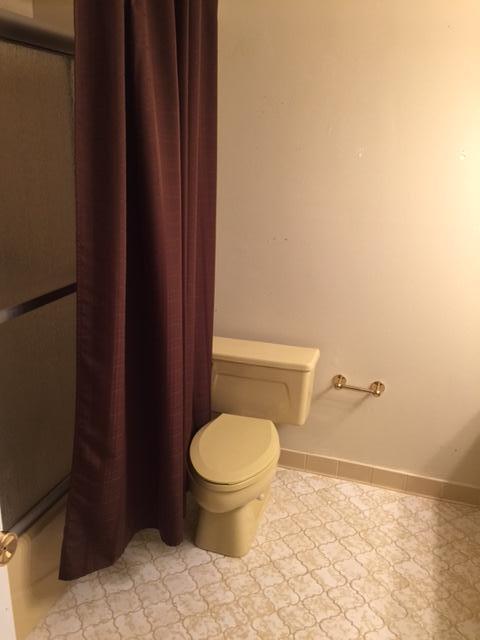 2055 Christensen Drive Navarre, FL 32566 - Photo 17 of 25 a bathroom with a toilet