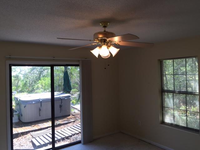 2055 Christensen Drive Navarre, FL 32566 - Photo 20 of 25 a view of an empty room and window
