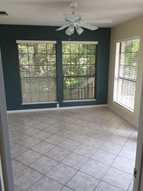 2055 Christensen Drive Navarre, FL 32566 - Photo 9 of 25 a view of an empty room with a window