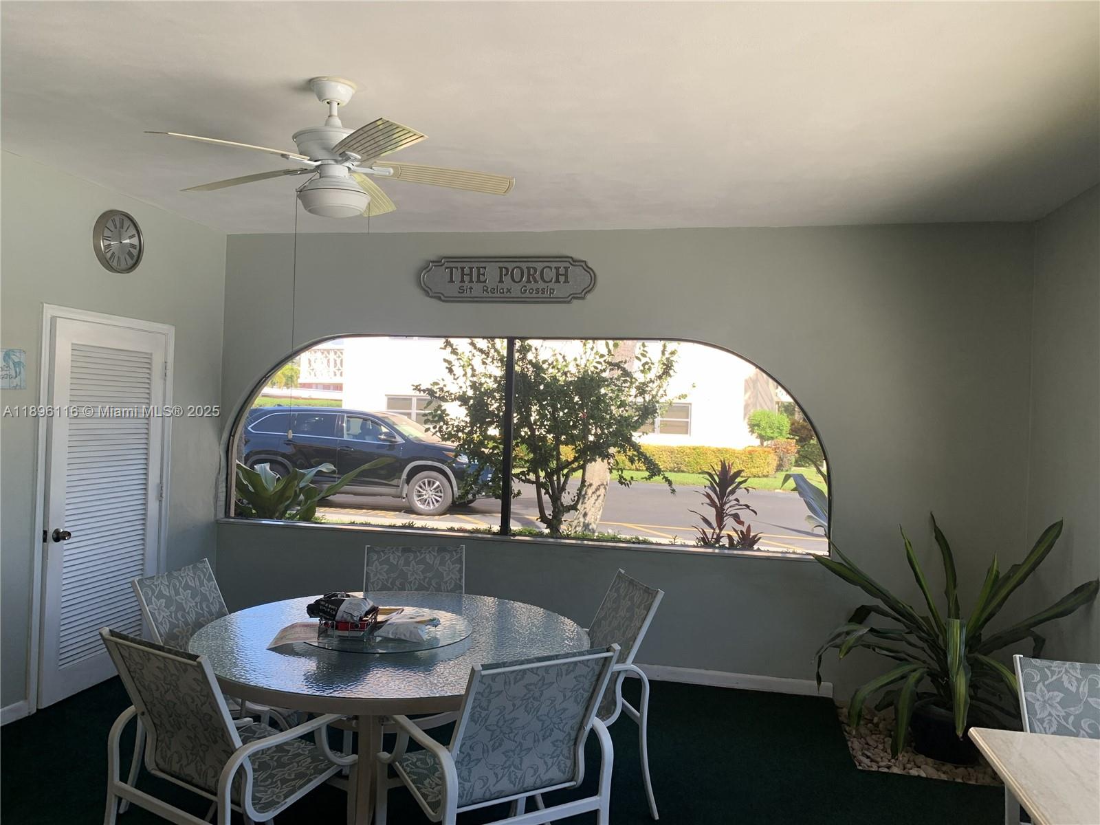 400 Northeast 20th Street, Unit A108 Boca Raton, FL 33431 - Photo 31 of 35 a view of a dining room with furniture and wooden floor