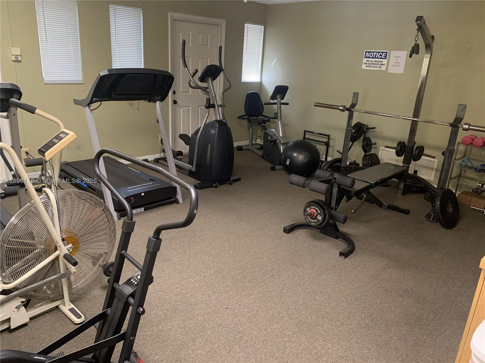 400 Northeast 20th Street, Unit A108 Boca Raton, FL 33431 - Photo 34 of 35 a view of a room with gym equipment