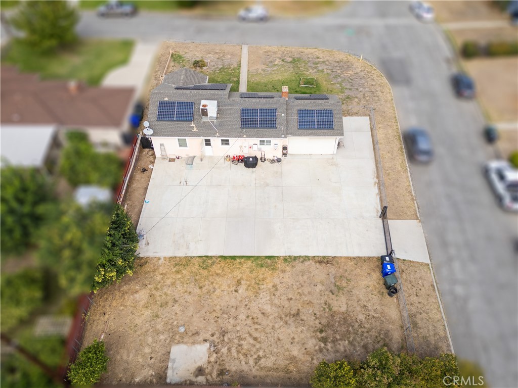 1555 Toluca Drive East San Bernardino, CA 92404 - Photo 12 of 13 a view of a house with a yard