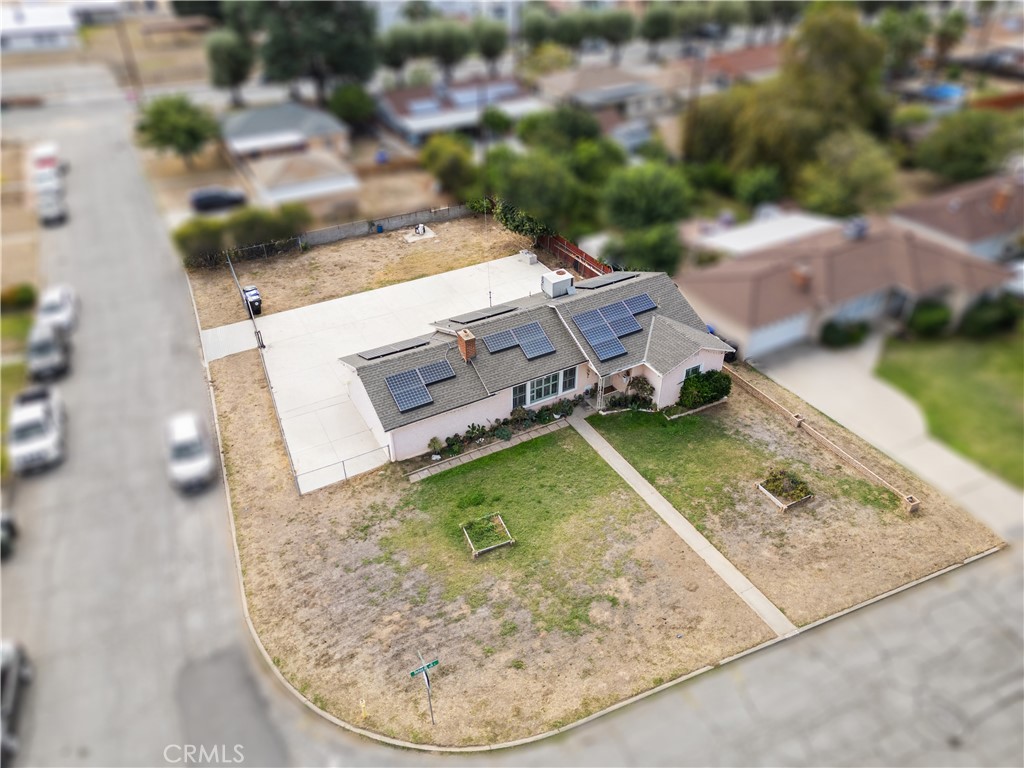 1555 Toluca Drive East San Bernardino, CA 92404 - Photo 2 of 13 an aerial view of a house