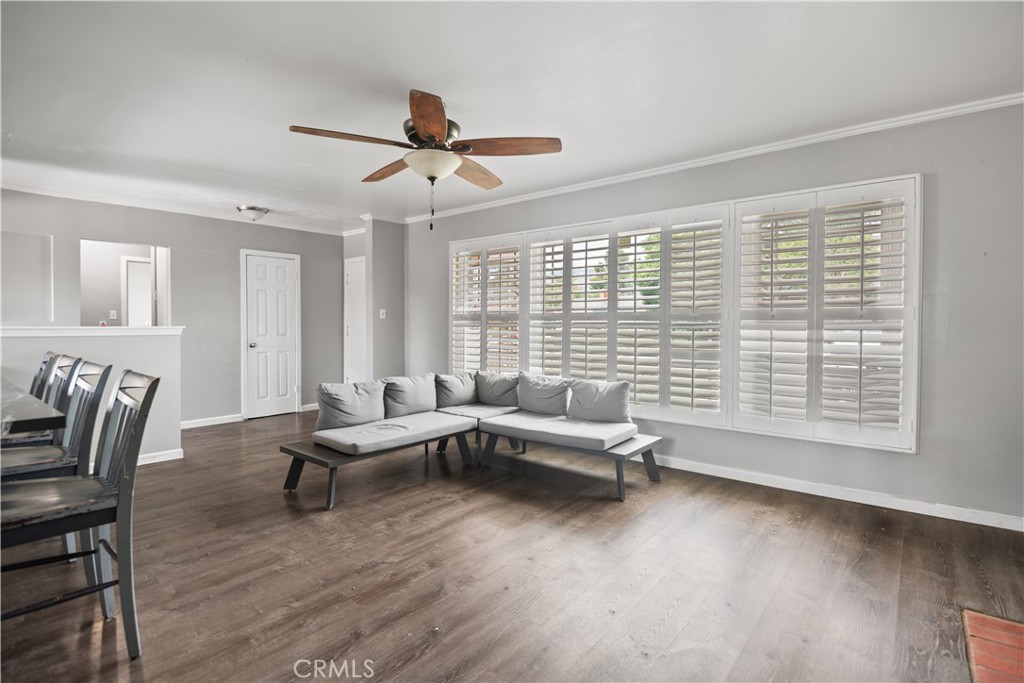 1555 Toluca Drive East San Bernardino, CA 92404 - Photo 4 of 13 a living room with furniture and a large window