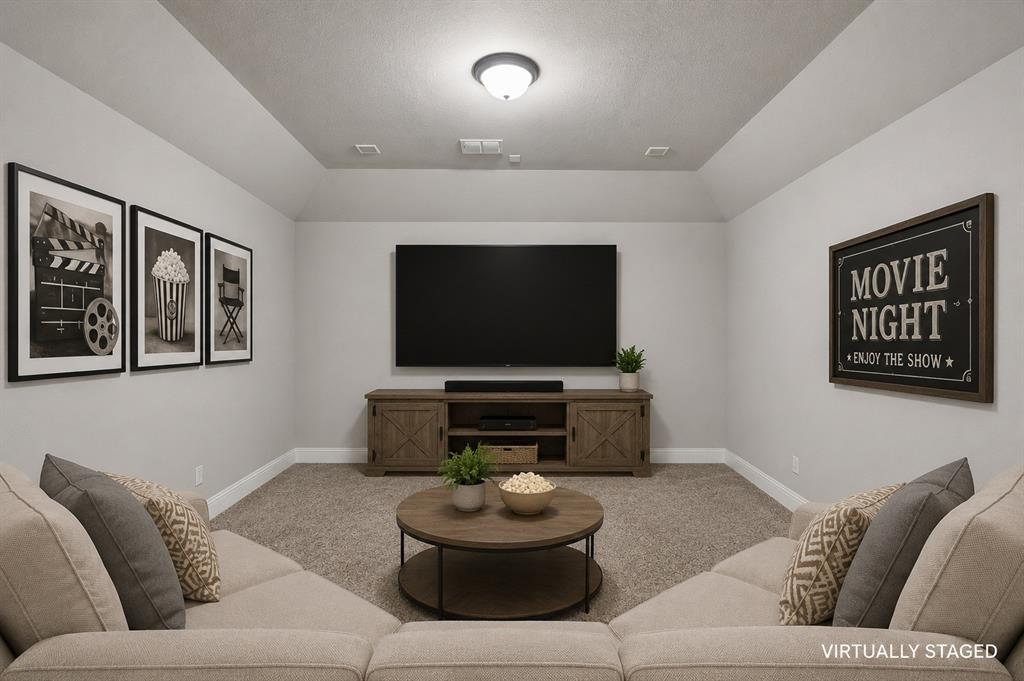 1014 Dunhill Lane Forney, TX 75126 - Photo 20 of 38 This media room is perfect for cozy evenings.
