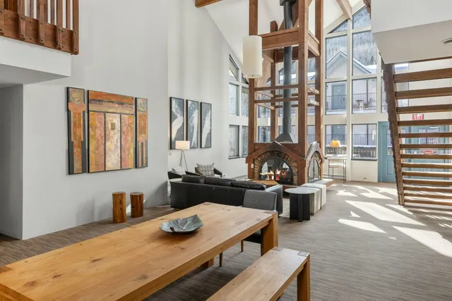 a view of house with a chairs in a patio