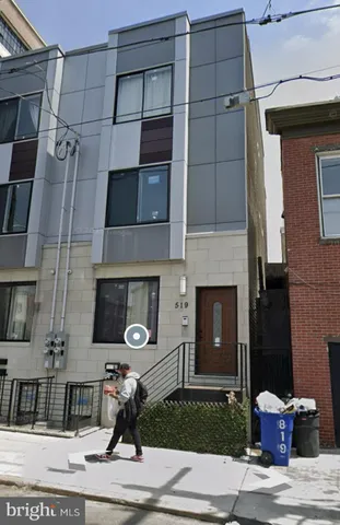 a front view of a house with yard