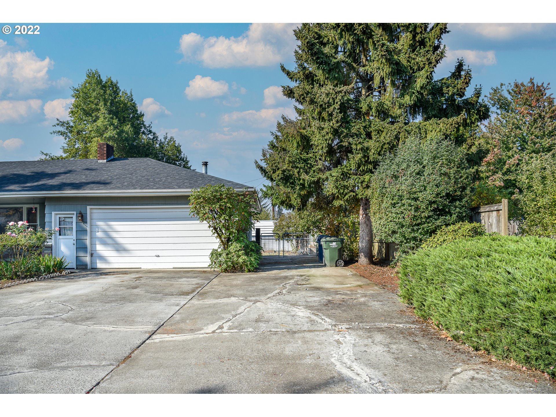 2308 Don Street Springfield, OR 97477 - Photo 26 of 30 a view of a house with a yard and garage