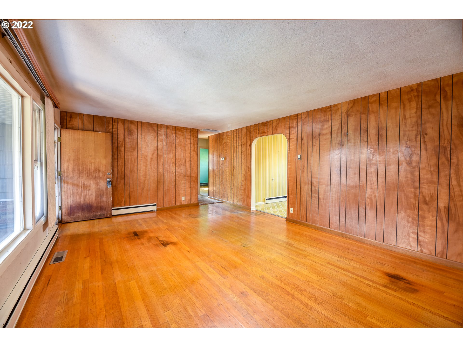 2308 Don Street Springfield, OR 97477 - Photo 6 of 30 wooden floor in an empty room with a window