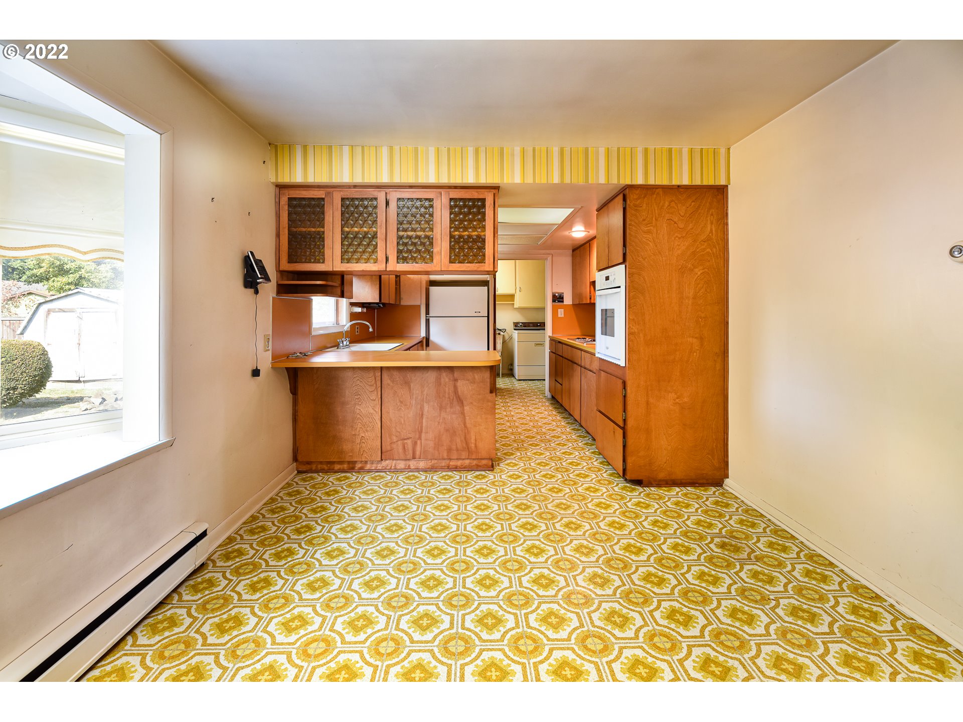 2308 Don Street Springfield, OR 97477 - Photo 10 of 30 a view of a kitchen with furniture and staircase