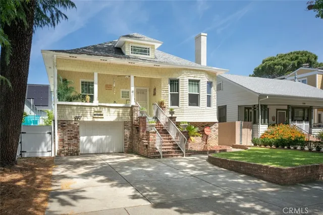 a view of a two chairs in the balcony