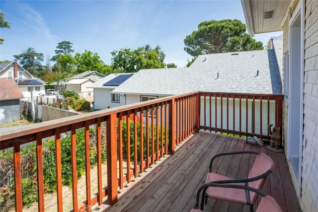 a view of a backyard with plants and a patio