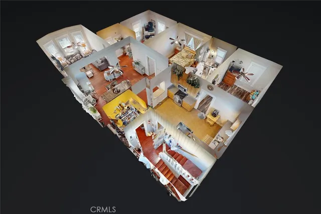 a kitchen with stainless steel appliances a stove a sink a microwave and cabinets