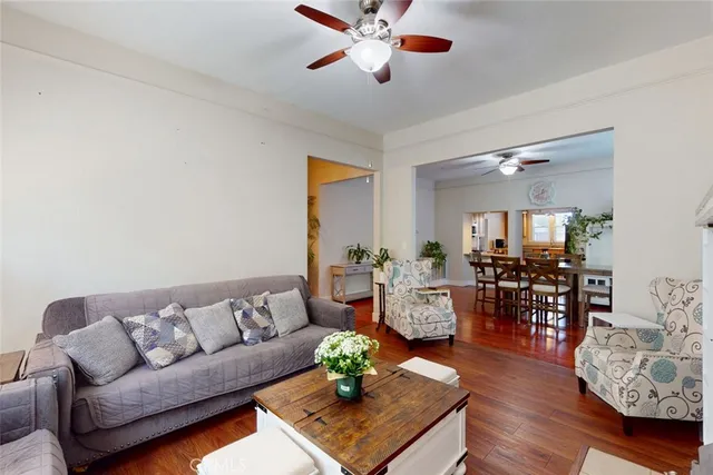 a kitchen with a sink appliances and cabinets