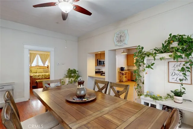 a view of a hallway with closet and livingroom