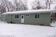 6618 Edgewood Drive Brighton, MI 48116 - Photo 6 of 25 Rear