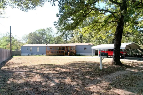 a house view with a outdoor space
