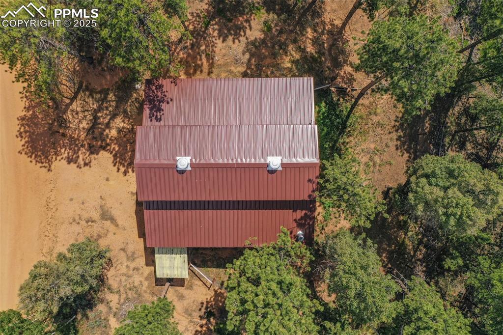 449 Woody Creek Road Divide, CO 80814 - Photo 9 of 21 an aerial view of a house with backyard and garden