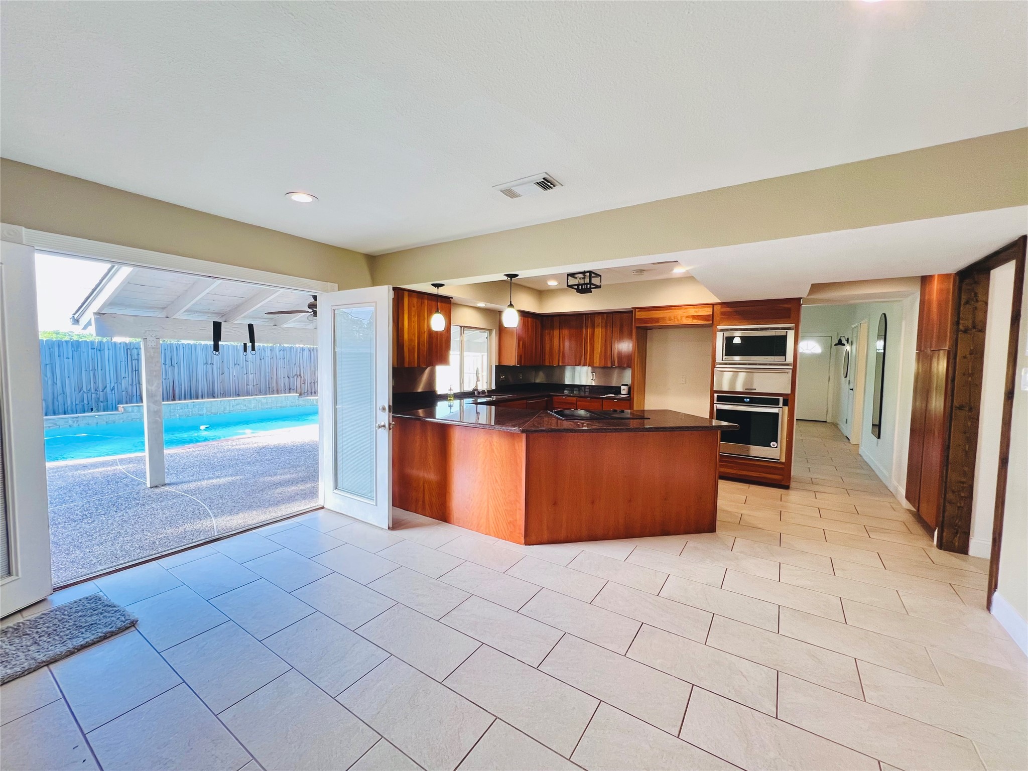 2602 Killdeer Lane Humble, TX 77396 - Photo 5 of 8 What a view! The kitchen/family room combo with french doors leading to your private oasis!