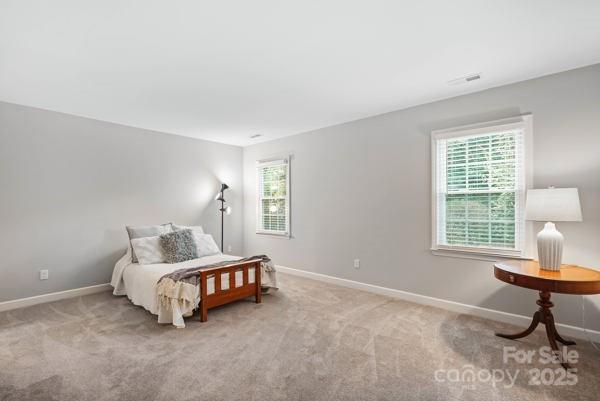 2707 Quailrush Road Charlotte, NC 28226 - Photo 15 of 29 a living room with furniture a window and a chair