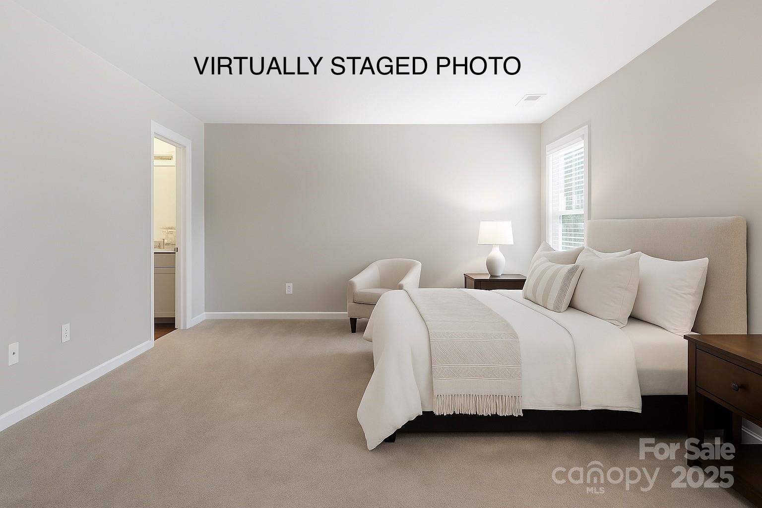 2707 Quailrush Road Charlotte, NC 28226 - Photo 18 of 29 a bedroom with a bed and a window