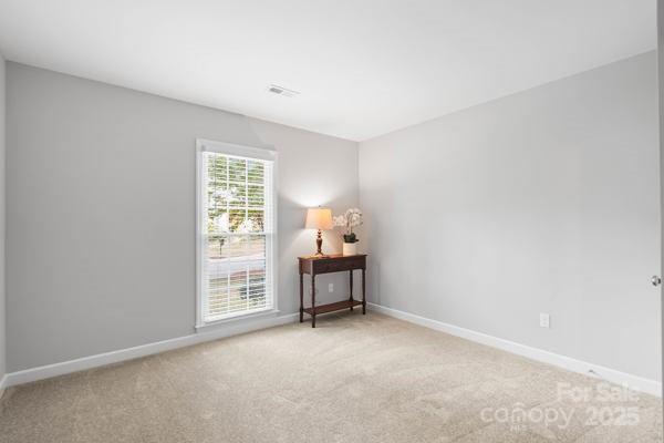 2707 Quailrush Road Charlotte, NC 28226 - Photo 22 of 29 a living room with furniture and window