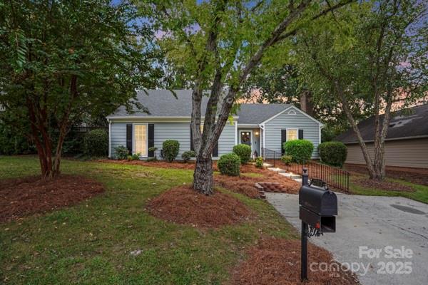 2707 Quailrush Road Charlotte, NC 28226 - Photo 3 of 29 a front view of a house with a yard