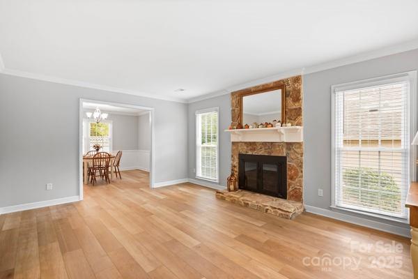 2707 Quailrush Road Charlotte, NC 28226 - Photo 6 of 29 a living room with furniture and a fireplace