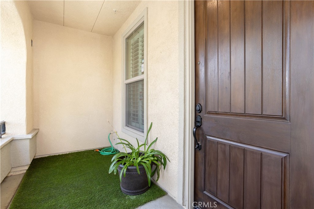 20335 Paseo Meriana Porter Ranch, CA 91326 - Photo 26 of 58 Charming Entryway Featuring a Private Enclosed Patio