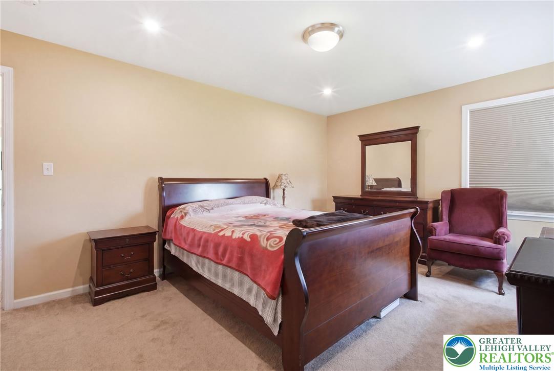 115 West Butternut Road Hellertown, PA 18055 - Photo 47 of 97 A comforting bedroom features plush carpeting and recessed lighting.
