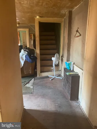 a view of chair and table in a room