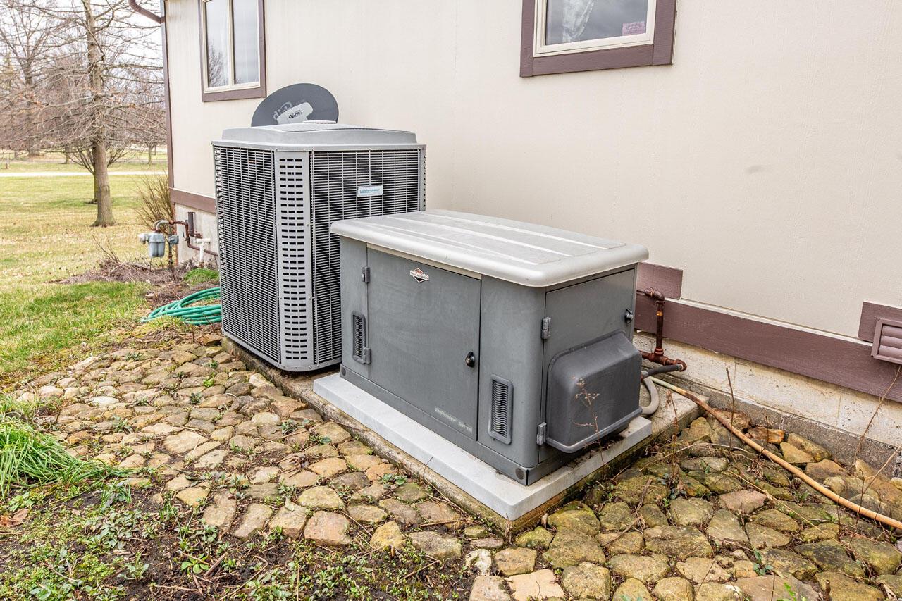 3744 Hazelton-Etna Road Southwest Pataskala, OH 43062 - Photo 47 of 87 AC Unit & Generator