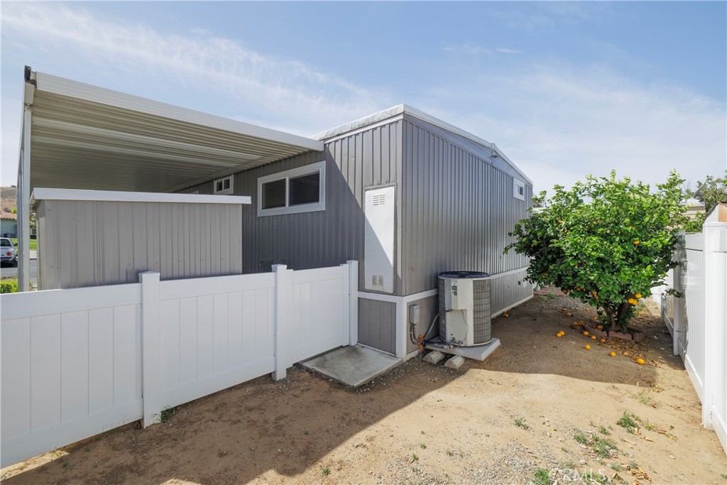 3700 Buchanan Street, Unit 131 Corona, CA 92503 - Photo 26 of 27 a backyard of a house