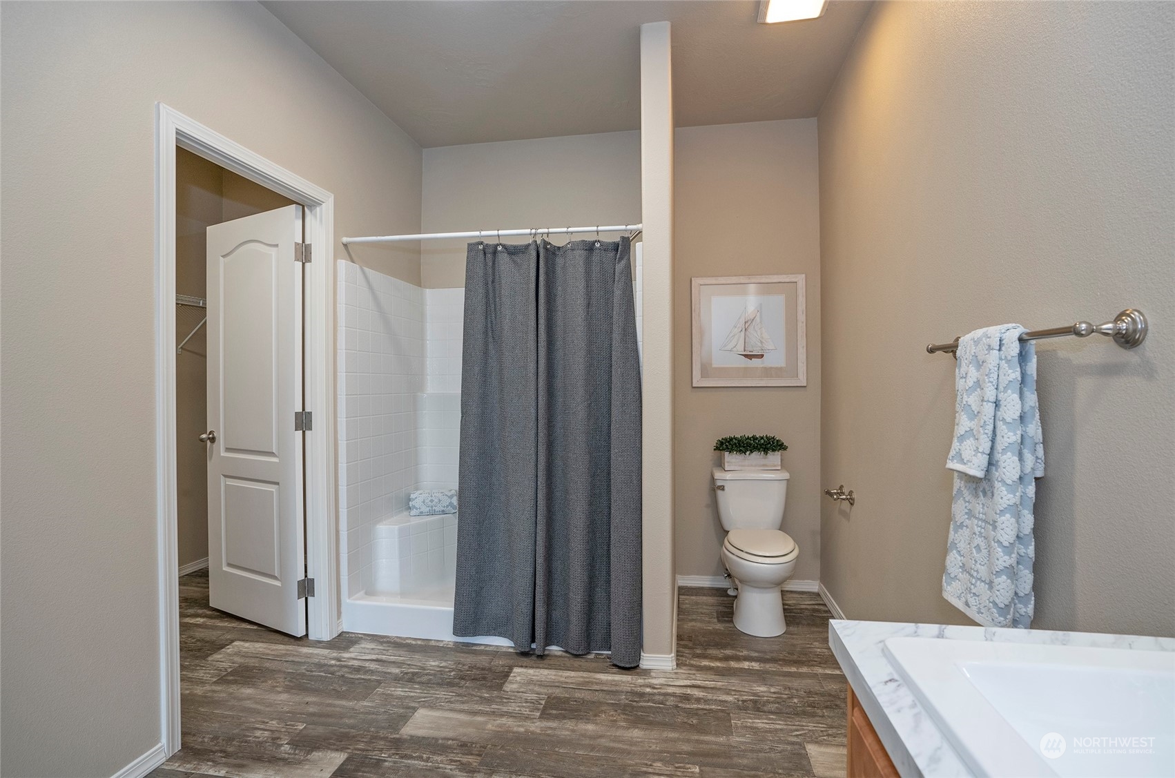 17202 Shantra Lane Southwest Rochester, WA 98579 - Photo 27 of 40 a bathroom with a shower and a toilet
