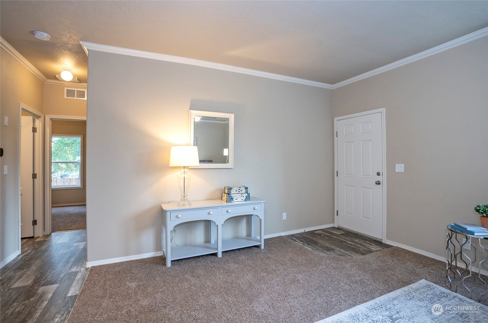 17202 Shantra Lane Southwest Rochester, WA 98579 - Photo 8 of 40 a room with a window and a dresser
