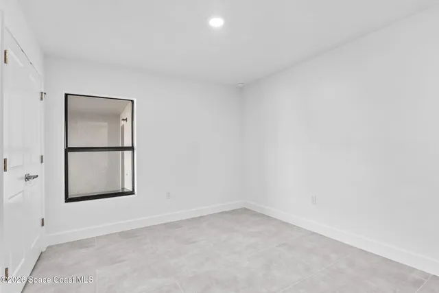 an empty room with a window