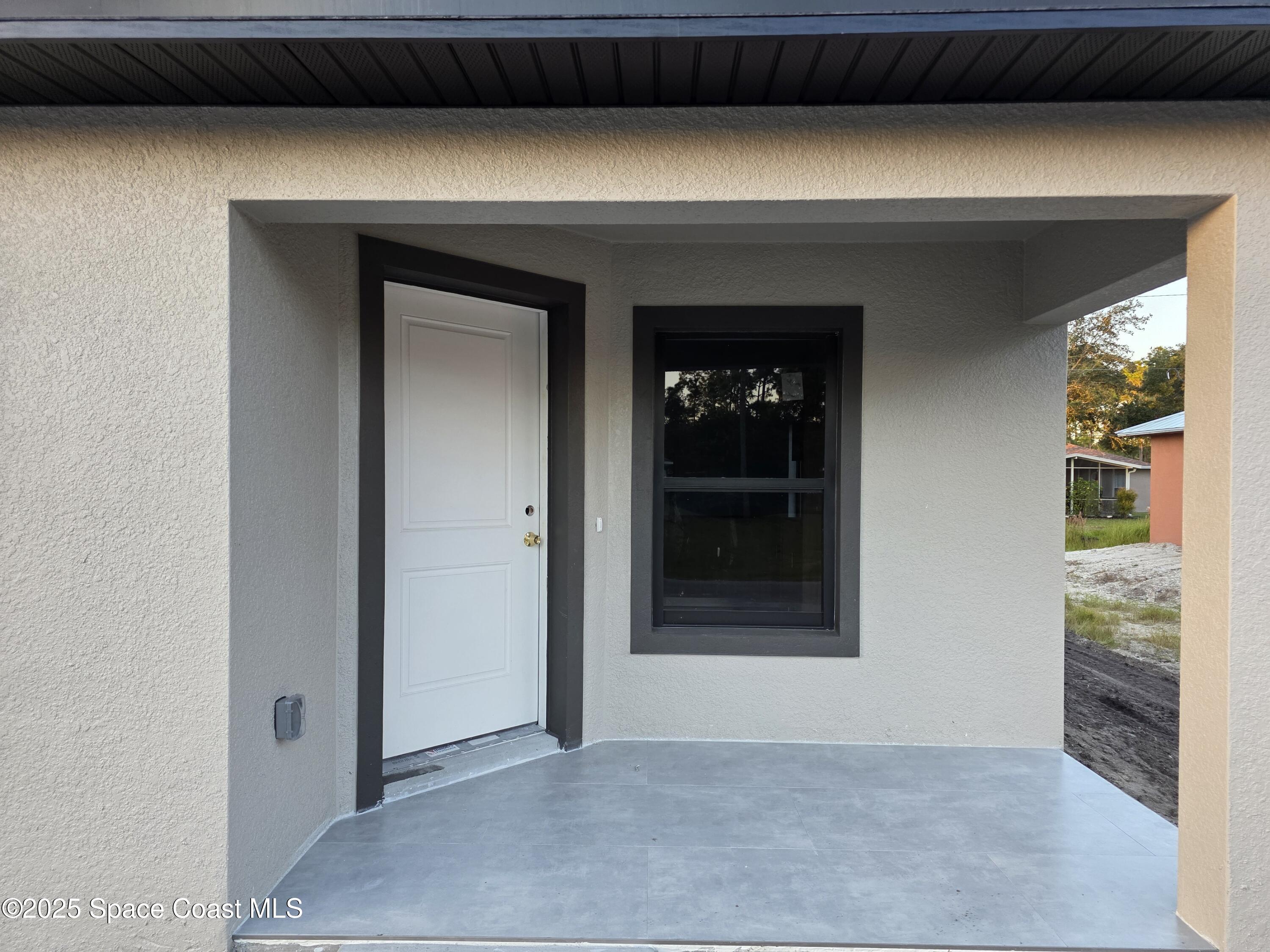 1659 Javier Street, Unit AB Palm Bay, FL 32909 - Photo 23 of 37 a view of an entryway of a house